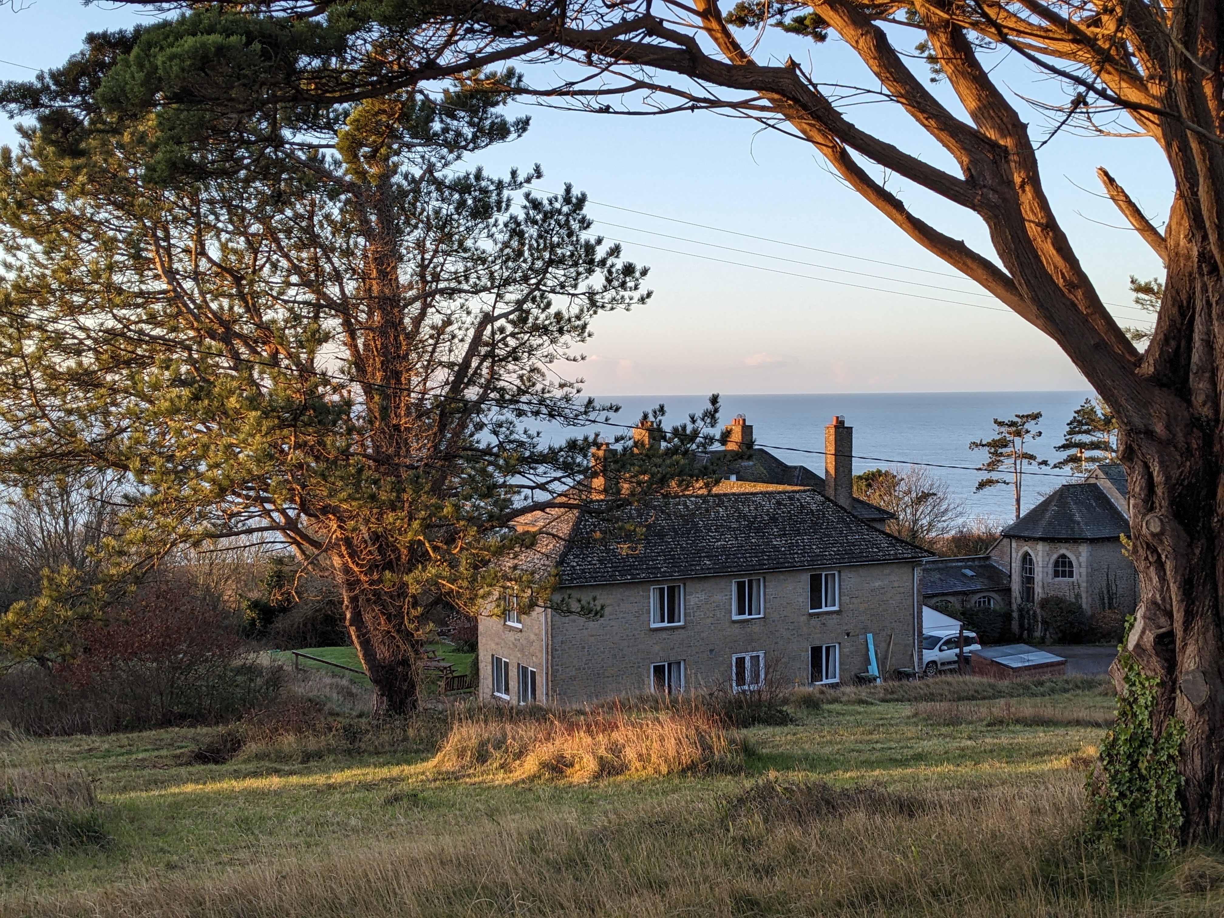 Othona Community House with the sea in the background