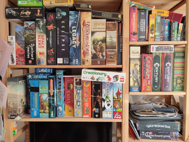 Shelves of board game boxes