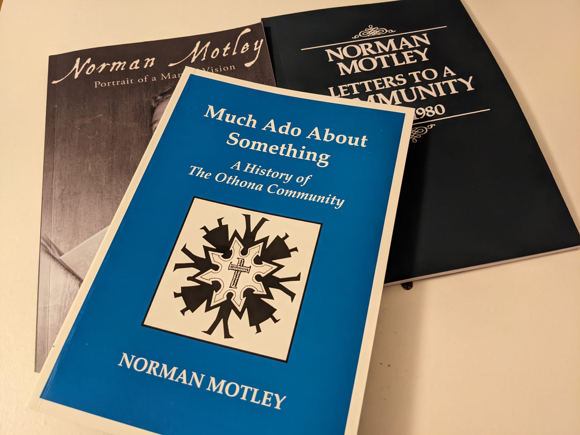 Book covers by and about Norman Motley, featuring Much Ado About Something