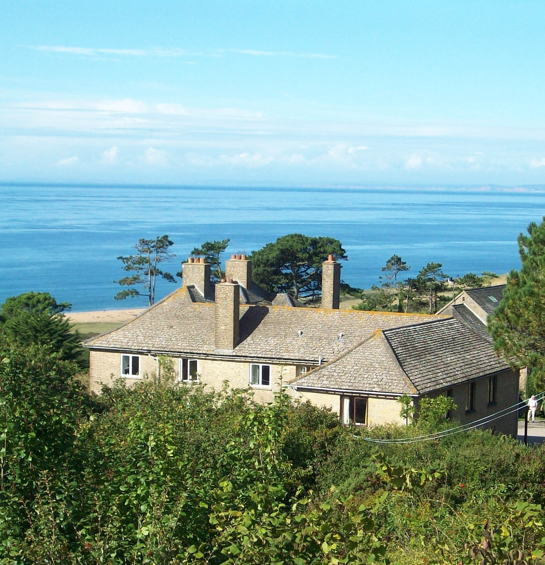 Othona COmmunity House and the woods, beach and sea beyond